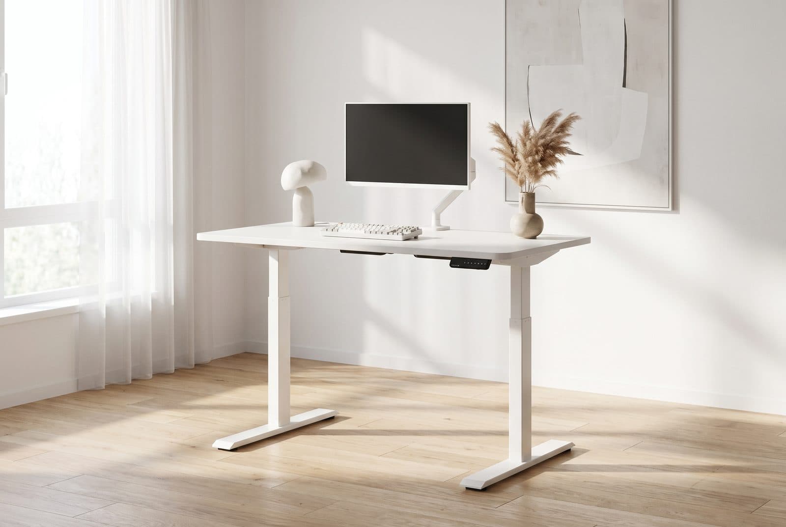 White Autonomous SmartDesk Core standing desk in a minimalist bedroom studio with a color-matched monitor and keyboard and soft window light
