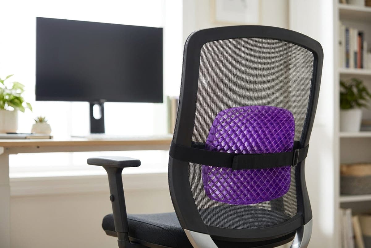 Purple Back Cushion with its hyper-elastic GelFlex grid strapped to a mesh office chair